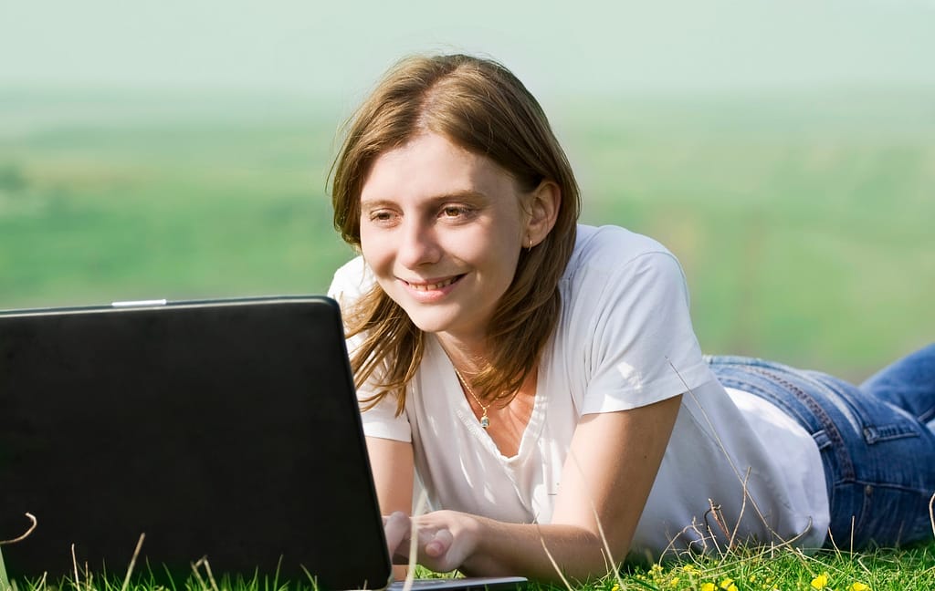 Happy woman at laptop